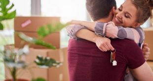 a girl hugs her friend in new home