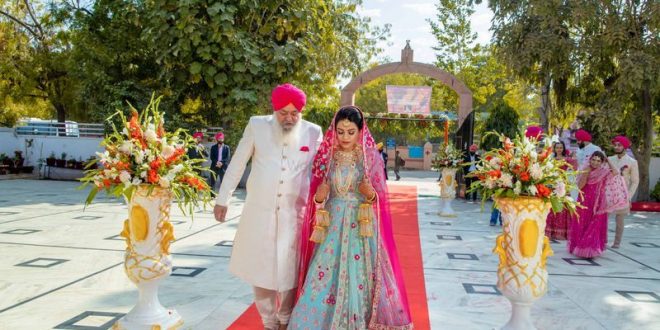 Sikh bride with father